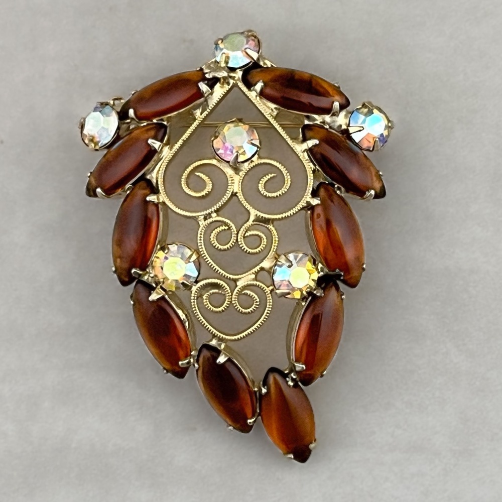 Vintage Root Beer Heart Scroll Brooch With AB Rhinestone Accents Gold Tone